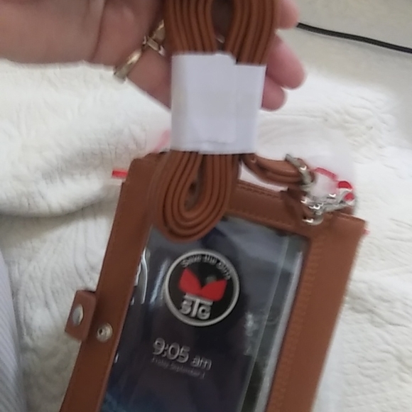 STG hand purse with shoulder strap and slip to put phone. Never used - Picture 8 of 12